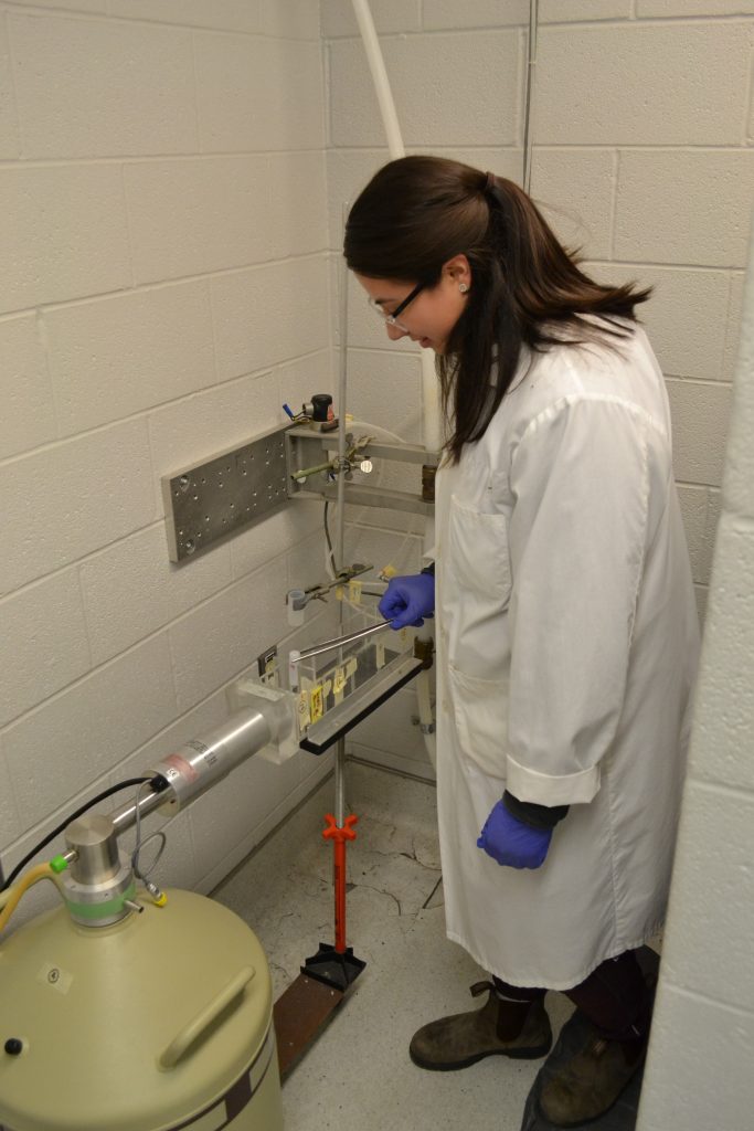 Researcher uses a HPGe detector inside a lab.