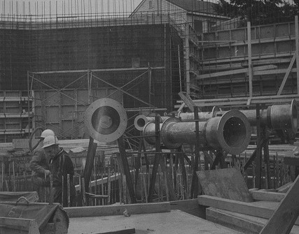 Beam tubes being fitted for McMaster Nuclear Reactor in 1958.