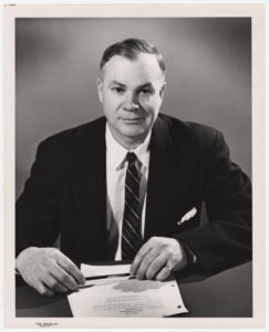 Harry Thode sitting at a desk.